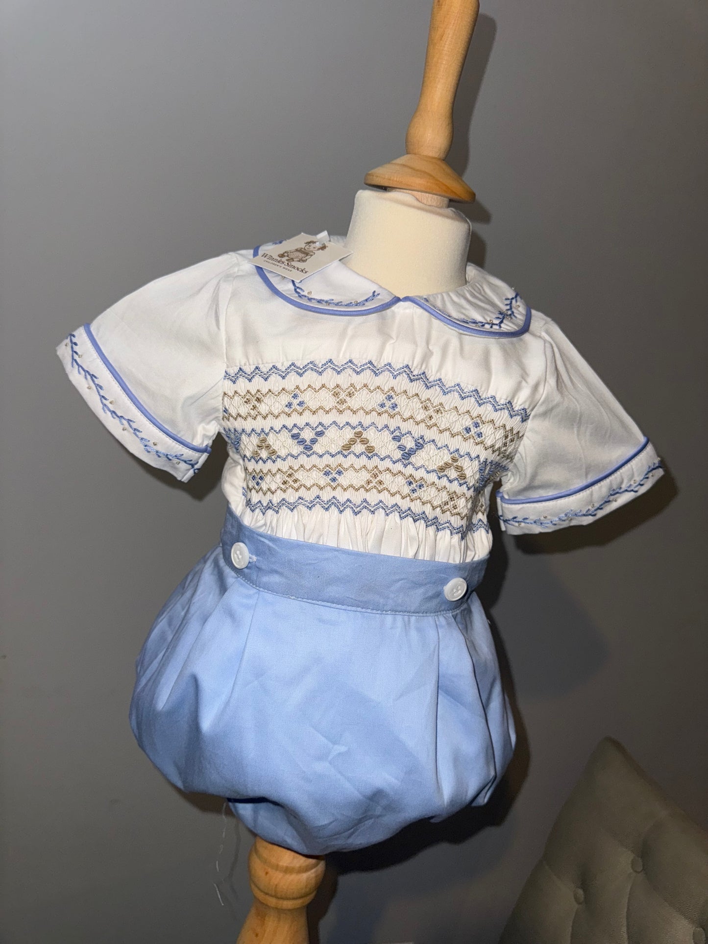 Baby blue romper smocked suit