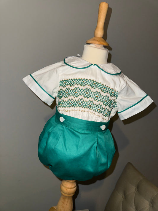 Green and gold smocked romper suit